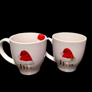 Two oversized Mr. and Mrs. Christmas mug